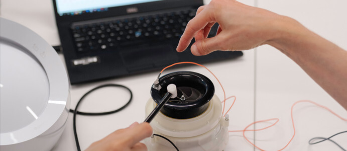 Engineers testing an electronic product