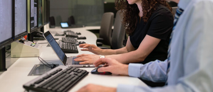 Engineers working on computers